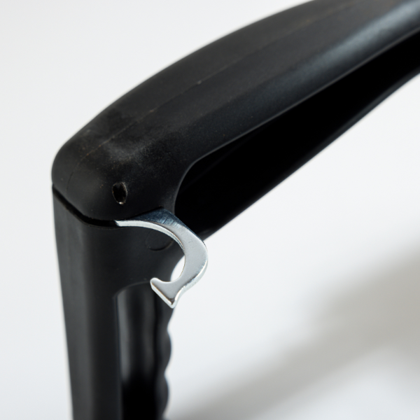 Scrub Daddy BBQ Daddy's retractable hook, highlighting its function for lifting grill grates and convenient storage, preventing burns.